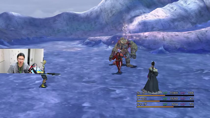FFXの雪原で緑色の大きな敵に3人の仲間が向き合い、左下にみつおの顔出し配信枠がある場面