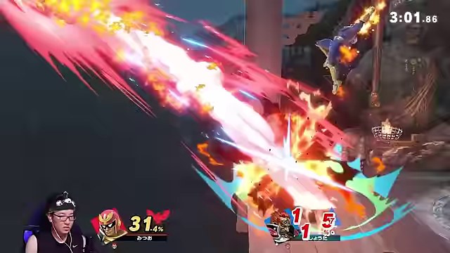 スマブラの対戦で炎と衝撃のエフェクトが大きく広がり、ファルコンが攻撃する画面
