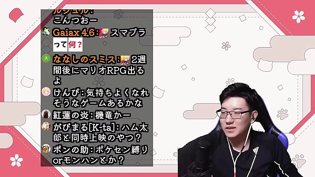 ピンク色の雑談配信画面で次に遊ぶゲームを考えるみつおと左側のチャット