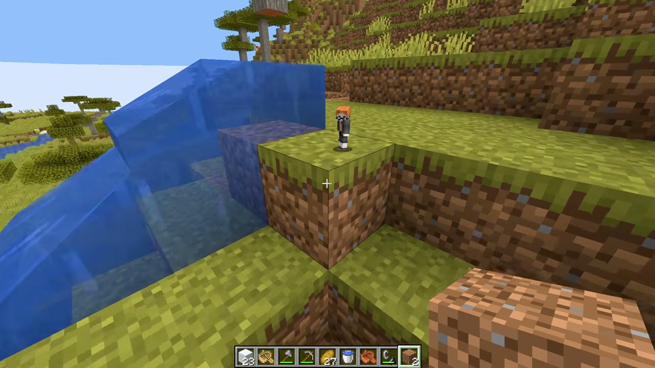 マイクラの草のブロックに小さなみつおのキャラクターが立つ場面