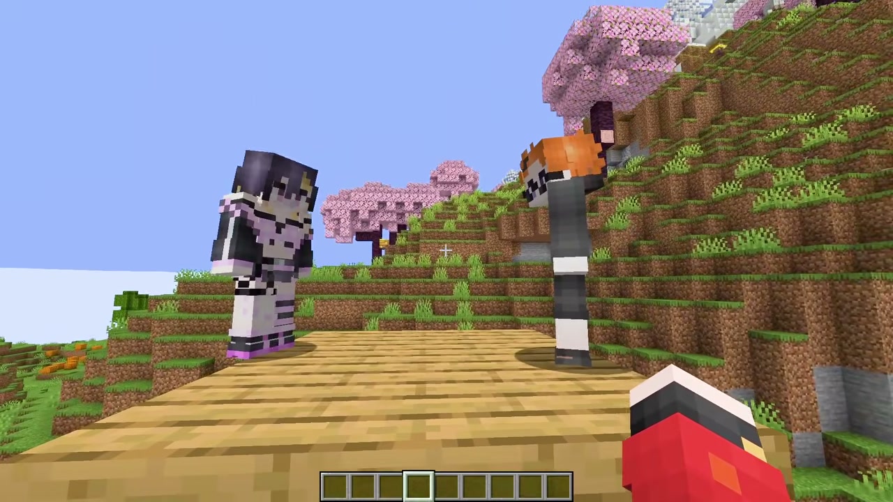 マイクラの木の足場でゆうちびとみつおのキャラクターが向き合う場面