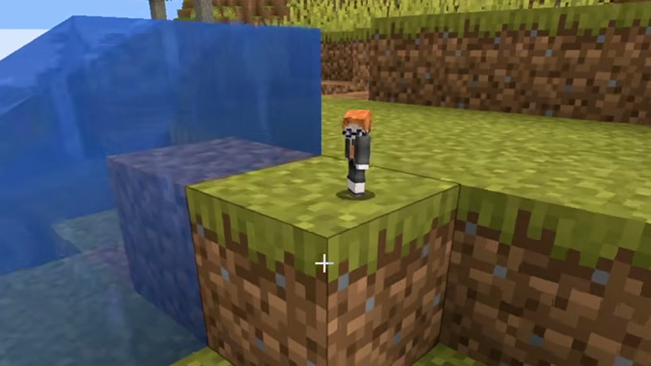 マイクラの草の足場に小さなみつおのキャラクターが立つサブチャンネル公式動画の場面