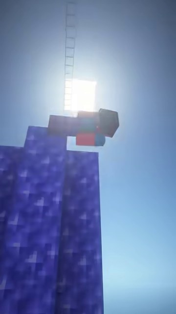 マイクラのアメジストの塔の先端に赤い服の山田が立ち、空と太陽を背にする縦画面