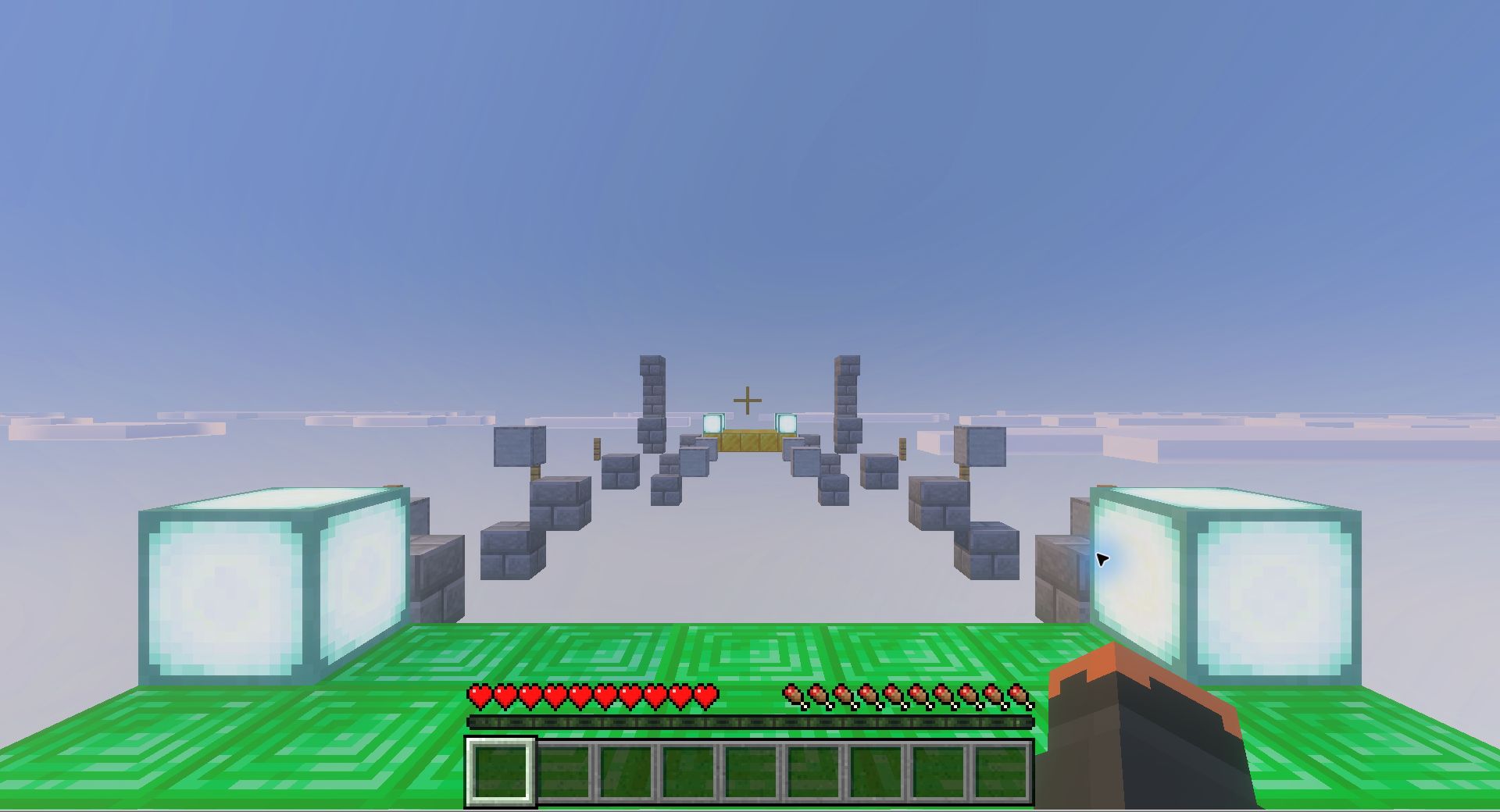 統合版Minecraftのエメラルドのスタート台から石の足場と金のゴールを見た実ゲーム画面